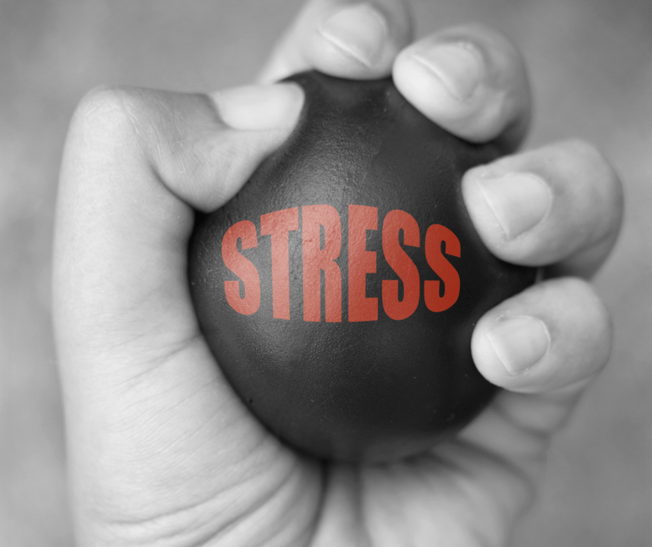 Squeezing a stress ball for stress. 